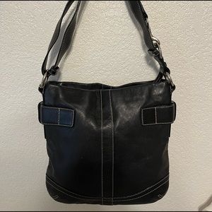 Black leather handcrafted Coach off the shoulder bag in amazing condition.